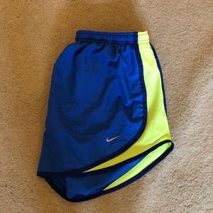 Nike blue and yellow running shorts